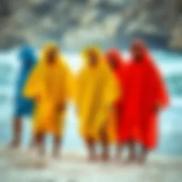 Vibrant changing ponchos displayed on a beach