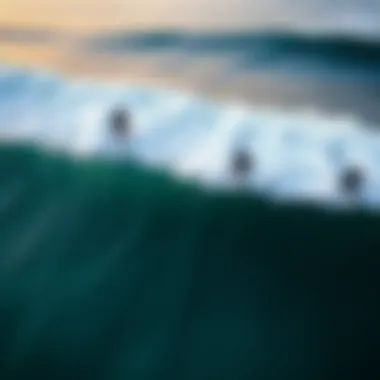 Aerial view of surfers riding waves with wind direction noted