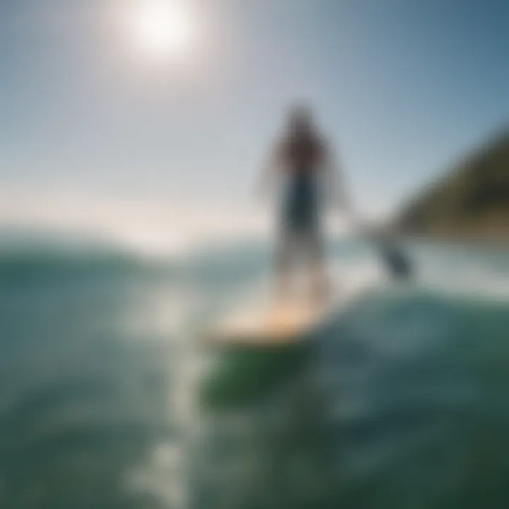 Person enjoying paddleboarding in serene waters