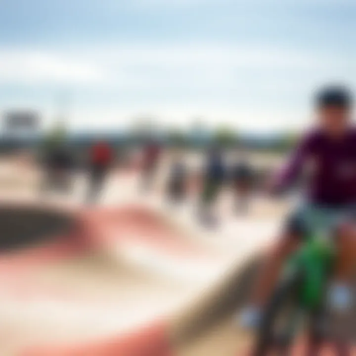 A diverse group of riders enjoying a pump track