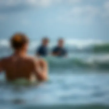 Surf school instructors guiding novices in the water
