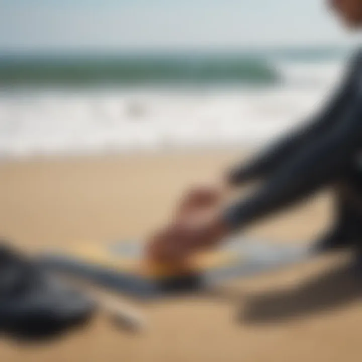 Surfer readying gear with wetsuit tape by the beach