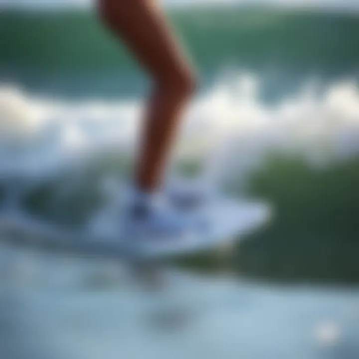 Surf Booties in Action Surfer enjoying a wave while wearing surf booties