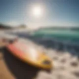 A vibrant foam longboard on a sunlit beach