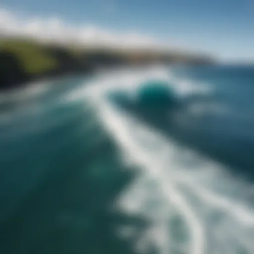 Stunning aerial view of Honolua Bay showcasing vibrant waves crashing against the shore