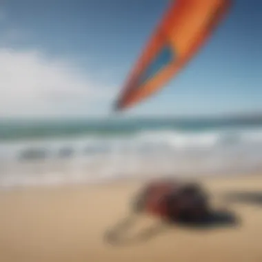 Essential kite surfing equipment displayed on the beach