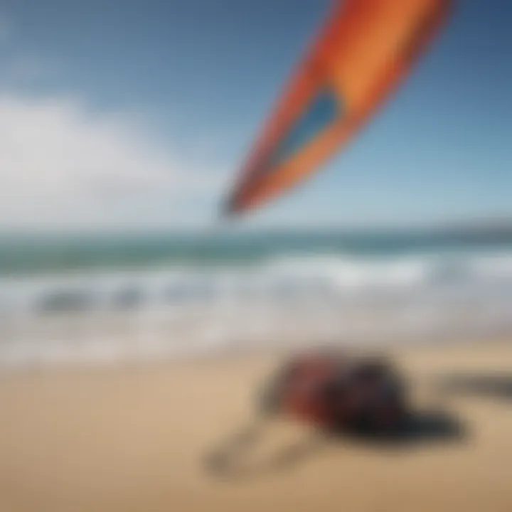 Essential kite surfing equipment displayed on the beach