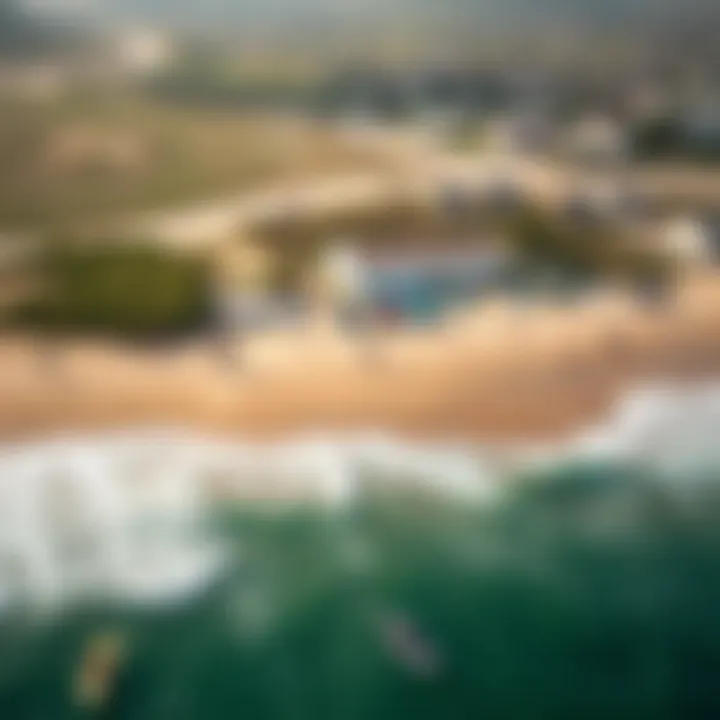 An aerial view of a kitesurfing beach with various enthusiasts