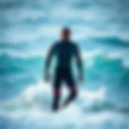 Olaian wetsuit showcased against a vibrant ocean background