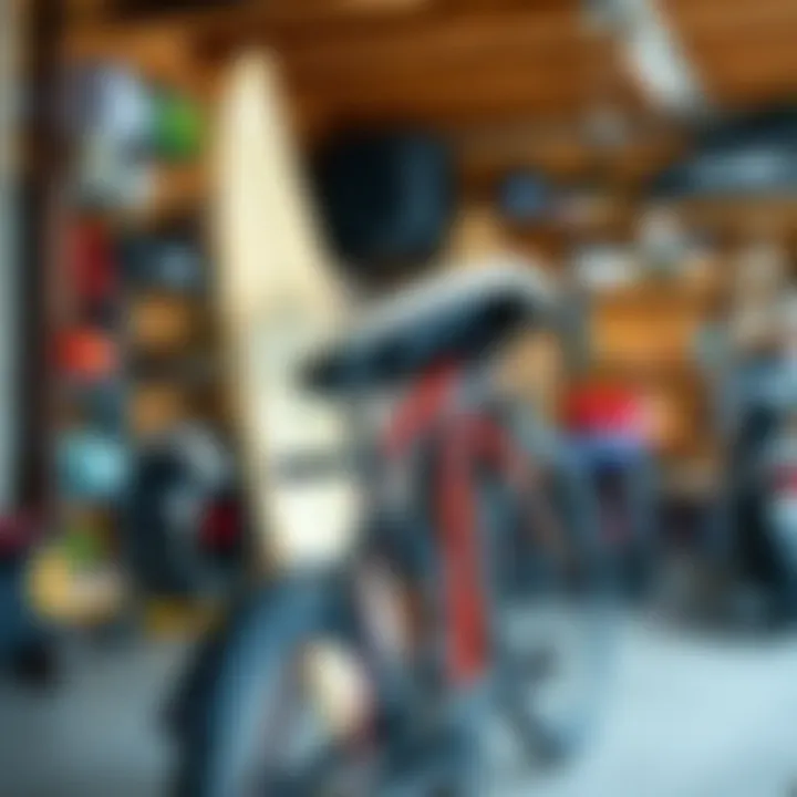 Installation of a surfboard holder on a bike frame in a garage