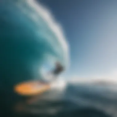 A captivating view of a wing surfer gliding over crystal-clear waters.