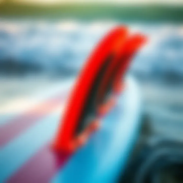 Fin Configuration for Optimal Performance A close-up of the fin setup on a lake surfboard, emphasizing performance features