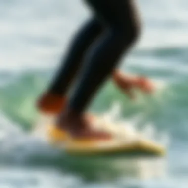 Surfer practicing techniques on calm water