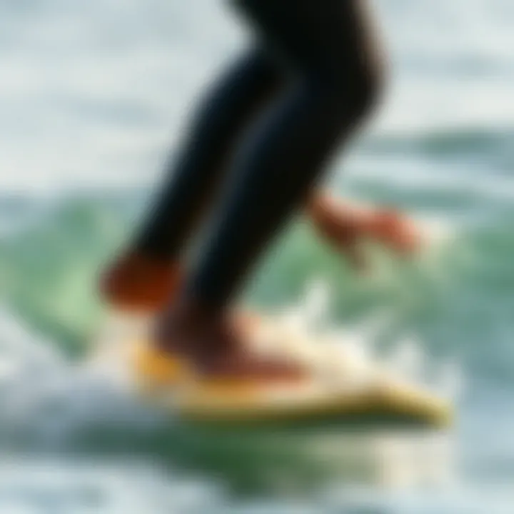 Surfer practicing techniques on calm water