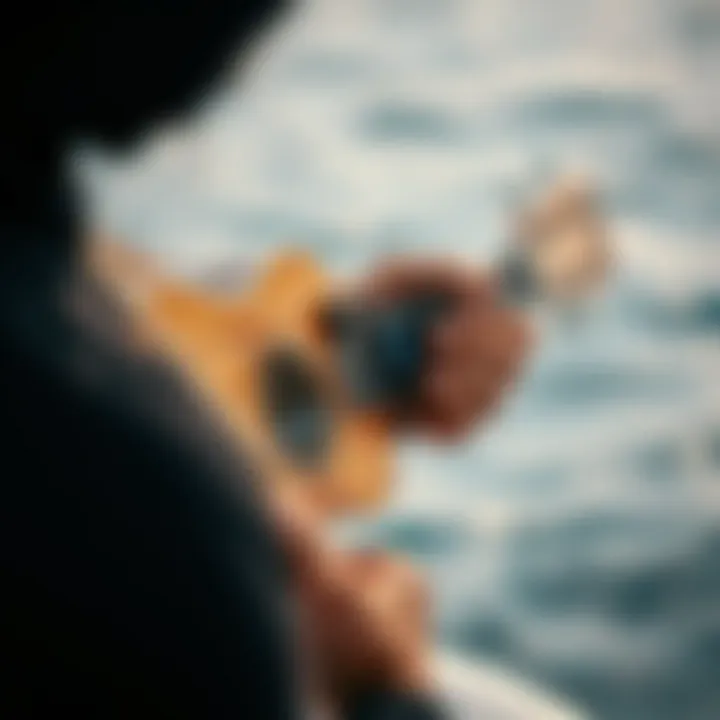 Musician tuning a ukulele with an electronic tuner