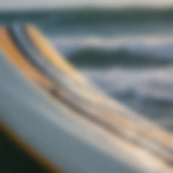 Close-up of FCS fins attached to a surfboard