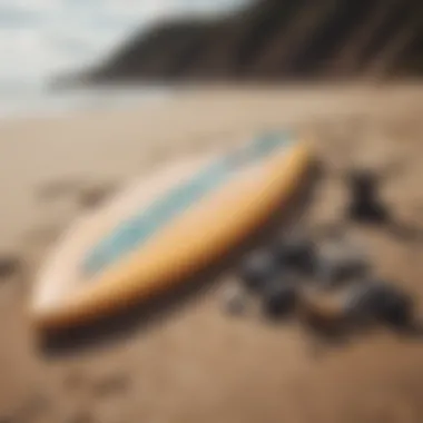 Surfboard essentials laid out on the sand