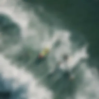 Aerial view of surfers enjoying the waves