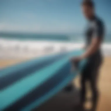 User holding a surfboard with a glossy finish