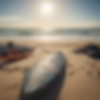 Kite surfing gear laid out on the beach