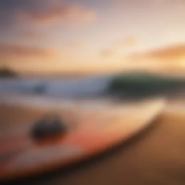 Surfboard resting on the beach at sunset in Kona Town