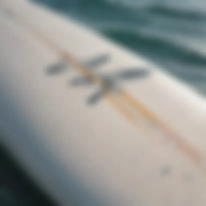 Close-up of surfboard dimensions with measurements marked.