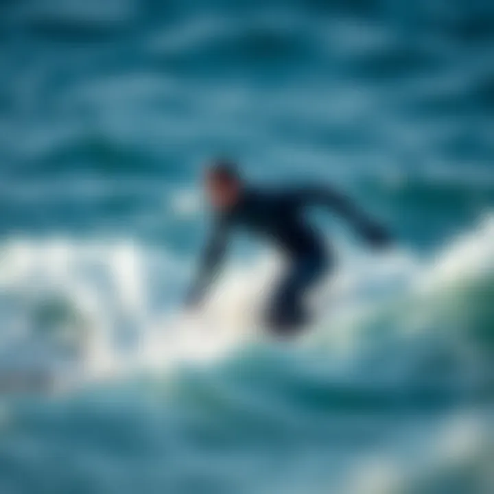 Mystic Drysuit in Action During Surfing Surfer utilizing the Mystic Drysuit in dynamic ocean conditions