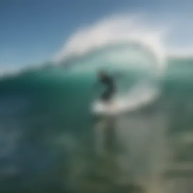 Surfer catching a wave in Cabo San Lucas