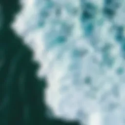 Aerial view of ocean waves crashing onto the shore