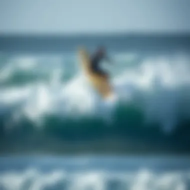 Odysea Surfboard in Action on the Waves Odysea surfboard in action on waves with surfer riding it