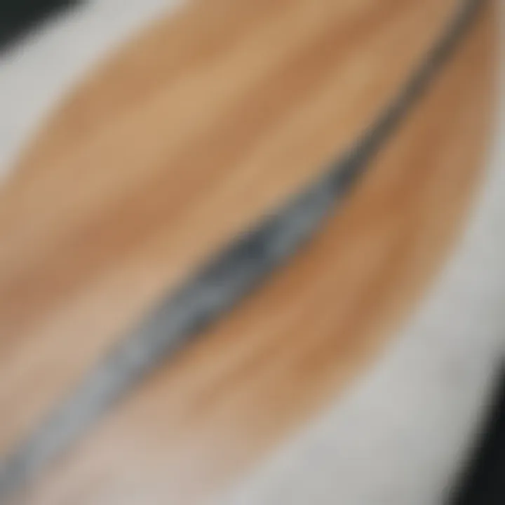 Close-up view of materials used in Raging Bull surfboard construction