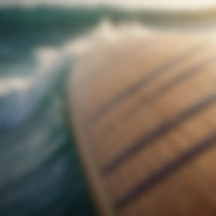 A close-up of a high-performance surfboard with detailed craftsmanship