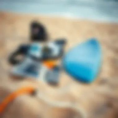 Essential surfing gear laid out on a sandy beach