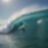 A surfer catching a wave at Cozumel beach