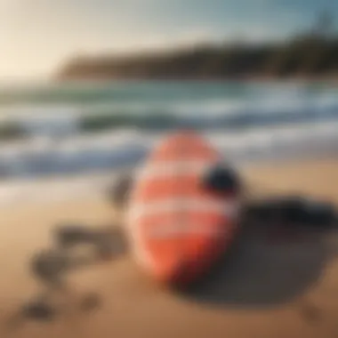 Essential surfing gear laid out on a sandy beach