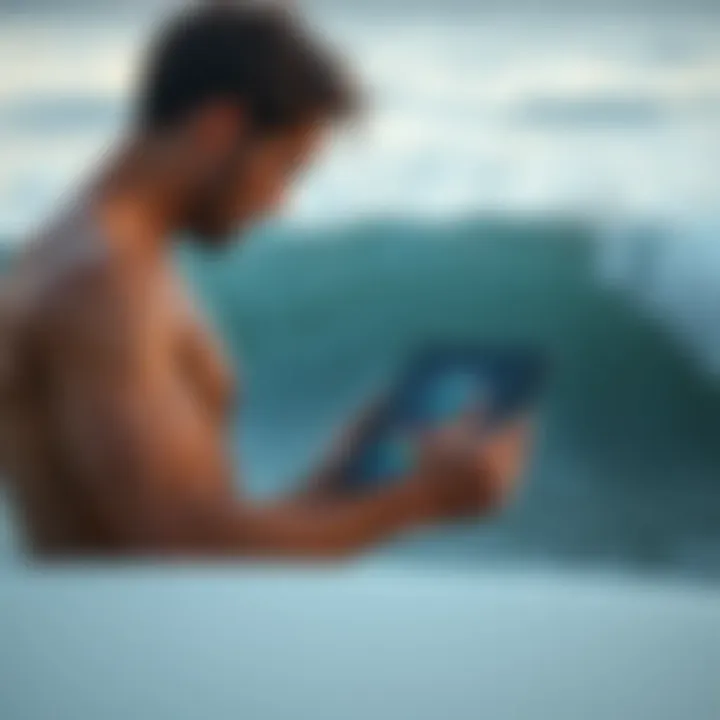 Surfer evaluating surf conditions using a tablet
