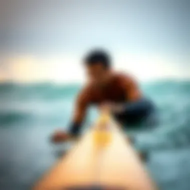Practical Application of Surf Paddle Trainers A surfer practicing with a paddle trainer in the water