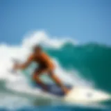 Surfer utilizing a paddle trainer for technique improvement