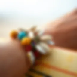 A close-up of a colorful surfer bracelet adorned with shells and beads