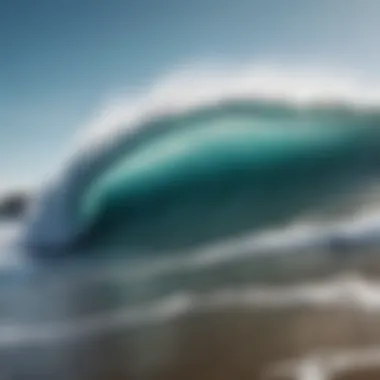 A stunning view of waves crashing against the shore under a clear blue sky