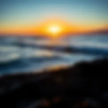 The Cultural Significance of Surfing in Maui A serene sunset over the ocean, reflecting surfing culture