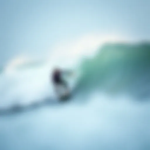 A surfer executing a drop-in maneuver on a wave