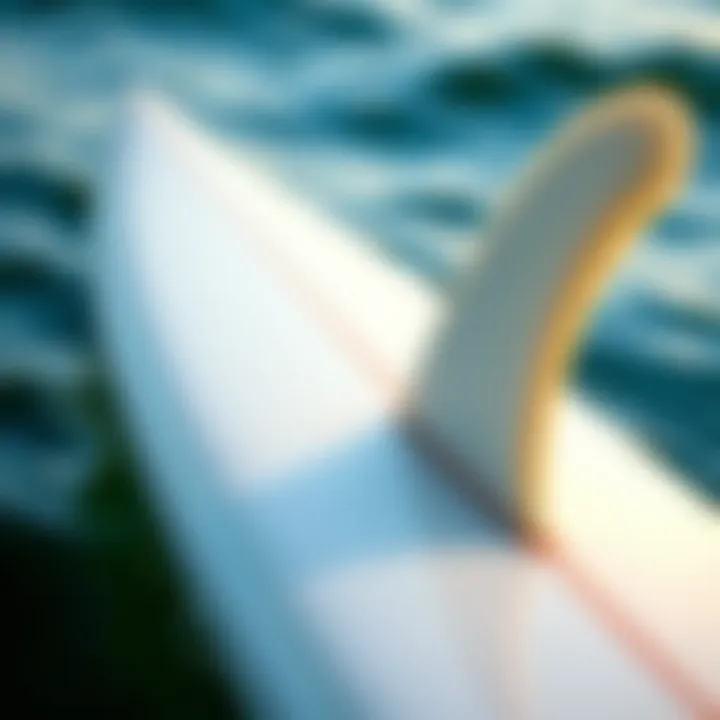 Close-up of a single fin surfboard showcasing its unique design