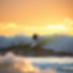 Surfer riding a wave at Malibu Beach